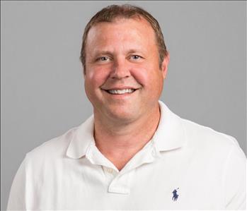 male employee headshot, white shirt